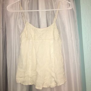 Flowy cream colored top with detailing